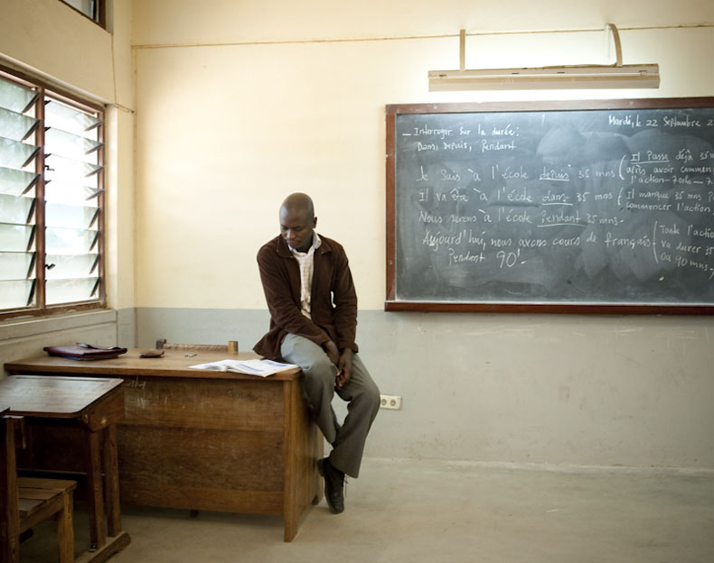 Ruco is a french teacher in a public school. He also teaches to policemen some nights to make about 00/month with a wife and 3 kids. He is raising money to built his own house. © Joan Bardeletti