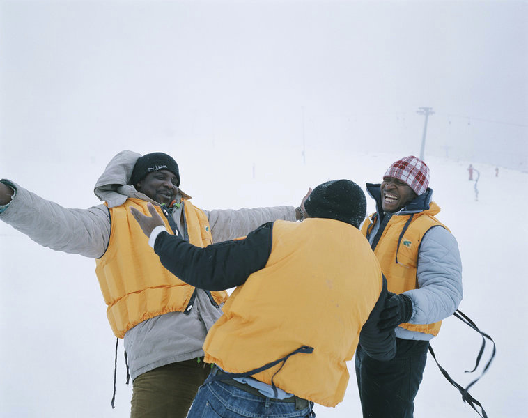 Three african immigrants from Nigeria (Henry, Ibrahim and Happy) are coming back to Monte Campione in a pilgrimage type trip 4 months after having left. It was also the first time they saw snow as snow storn wellcomed them back. © Joan Bardeletti